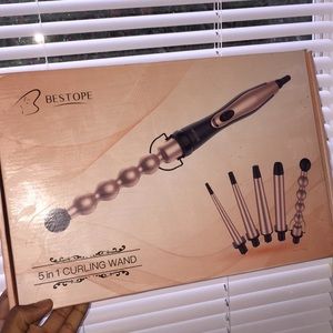 A Bestope 5 in 1 Curling wand😍